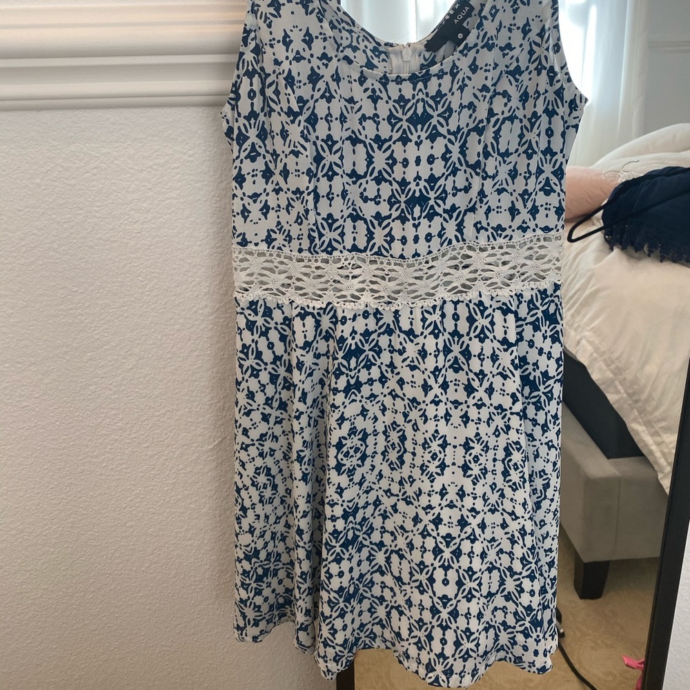 Blue and white dress with lace waist